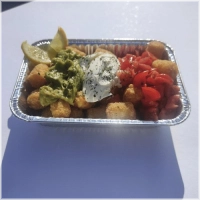guacamole,roomkaas,cherry tomaten en peterselie