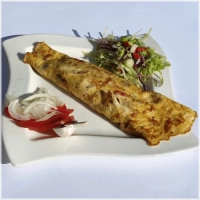Geserveerd met salade